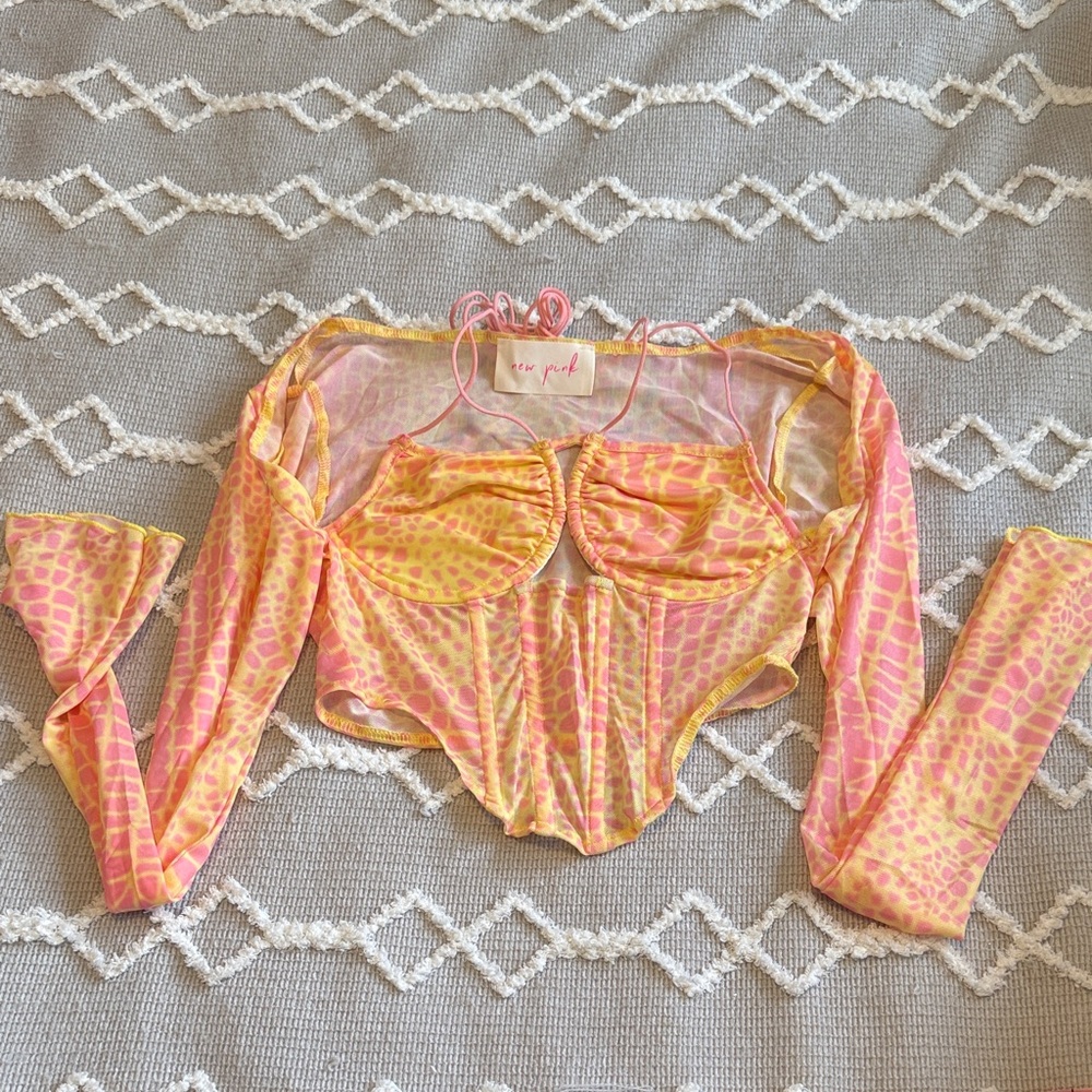 New Pink from Dolls Kill pink & yellow animal print corset top. Runs small